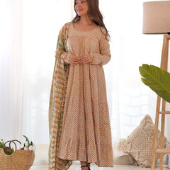 Creamy yellow tiered anarkali set