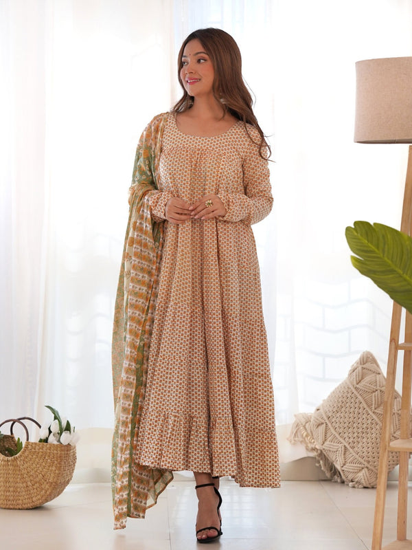 Creamy yellow tiered anarkali set