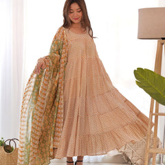 Creamy yellow tiered anarkali set