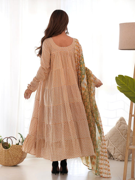 Creamy yellow tiered anarkali set