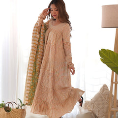 Creamy yellow tiered anarkali set