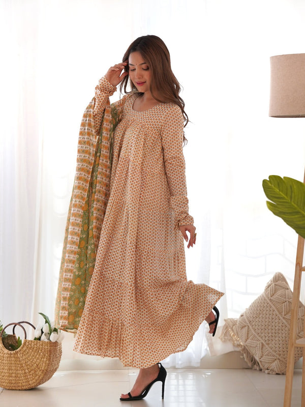 Creamy yellow tiered anarkali set