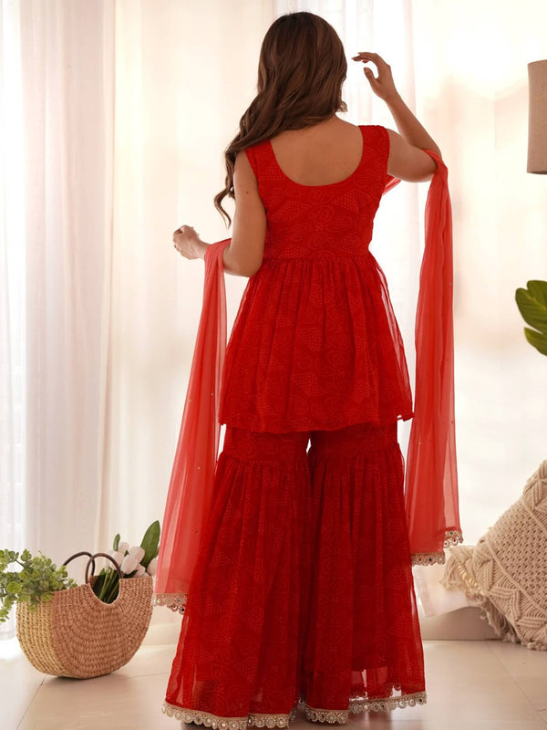Red bandhani Peplum kurta sharara set