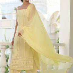 yellow chikankari suit set